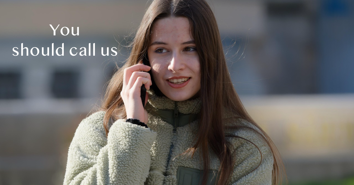 Woman talking on phone with text "You should call us"