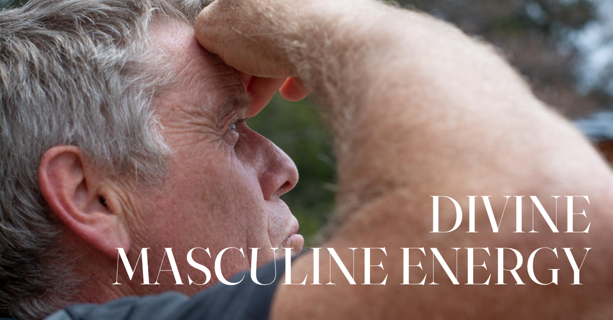 man looking up with hand shielding face with text "divine masculine energy"
