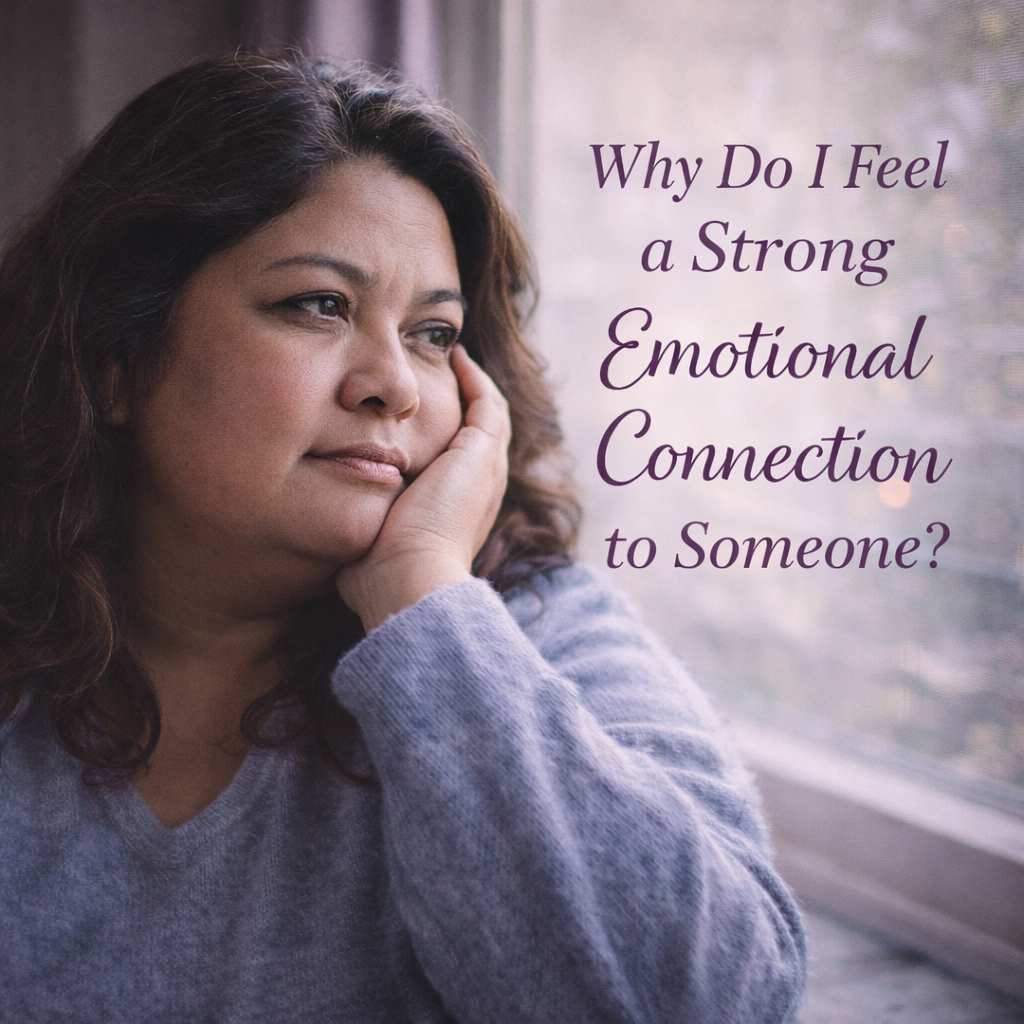 thoughtful woman looking out a window reflecting on why she feels a strong emotional connection to someone