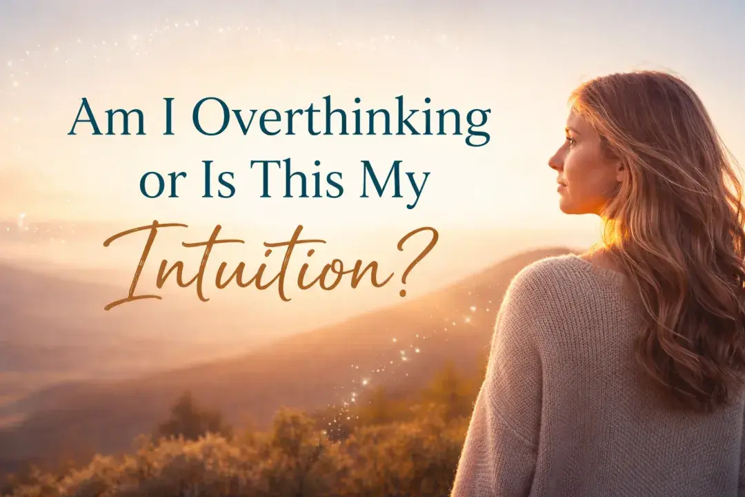 woman standing on a hill at sunset, looking toward the horizon with text that reads “Am I Overthinking or Is This My Intuition?”
