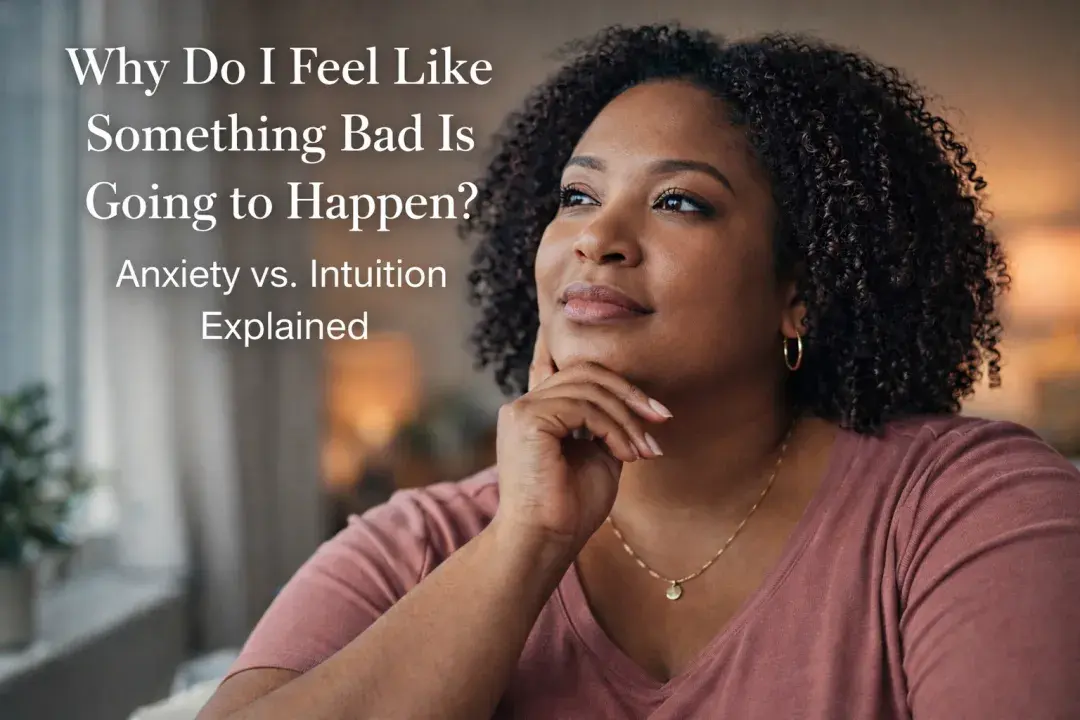 Confident woman thoughtfully looking ahead, representing the feeling of sensing something bad may happen and questioning whether it is anxiety or intuition
