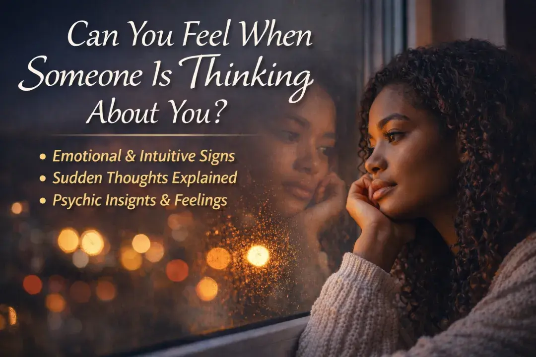 thoughtful woman looking out window wondering if someone is thinking about her emotional and intuitive connection