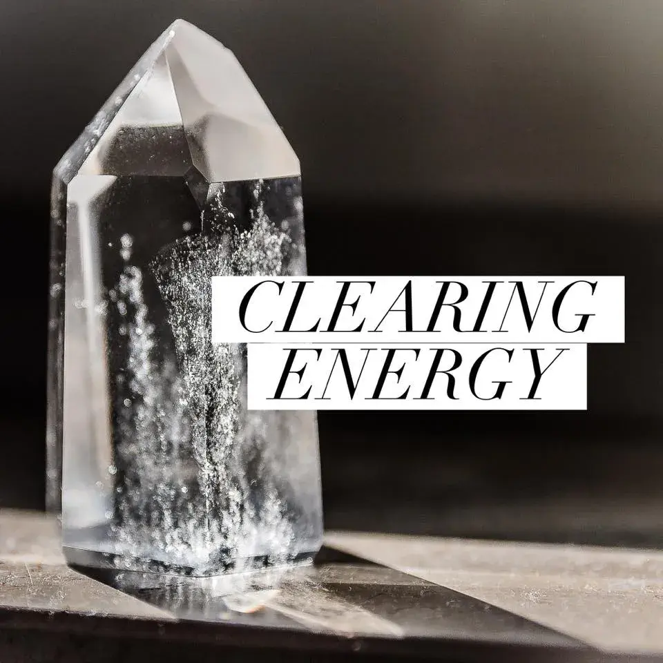 clear crystal on grey background with text "energy clearing"