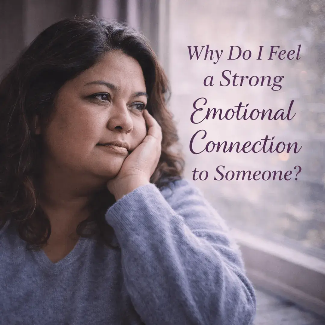 thoughtful woman looking out a window reflecting on why she feels a strong emotional connection to someone