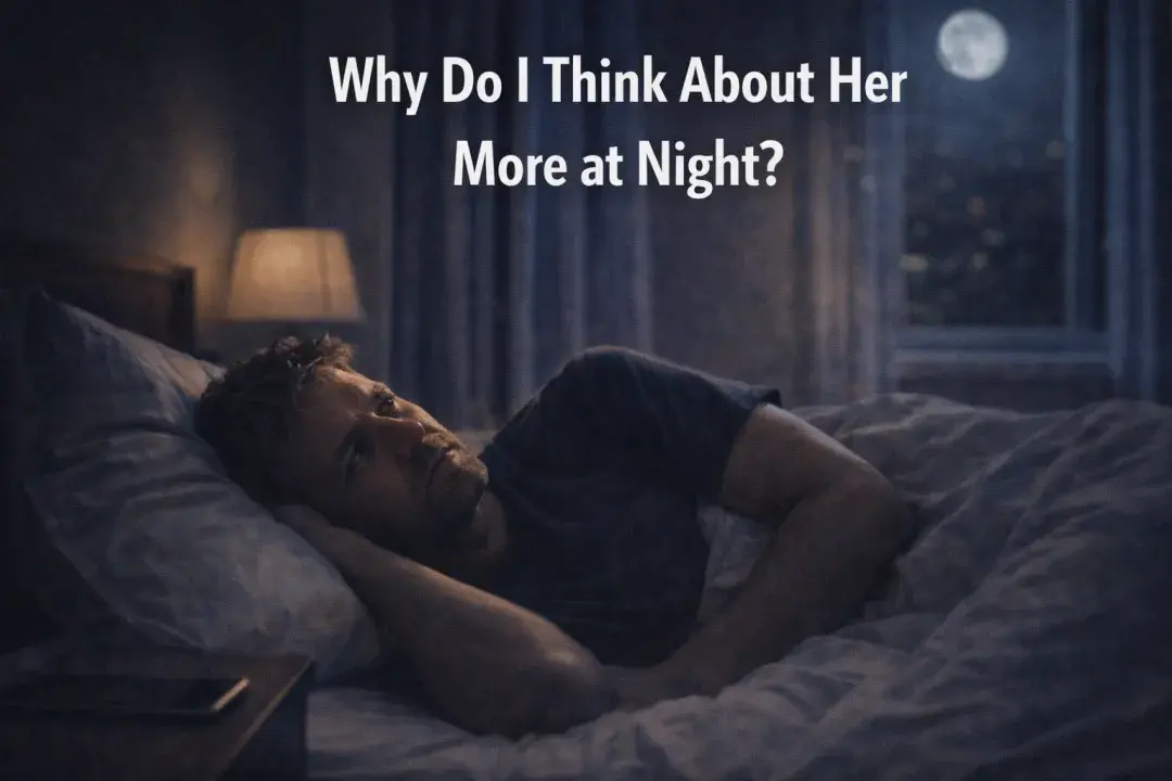 Man lying awake at night thinking about a past relationship