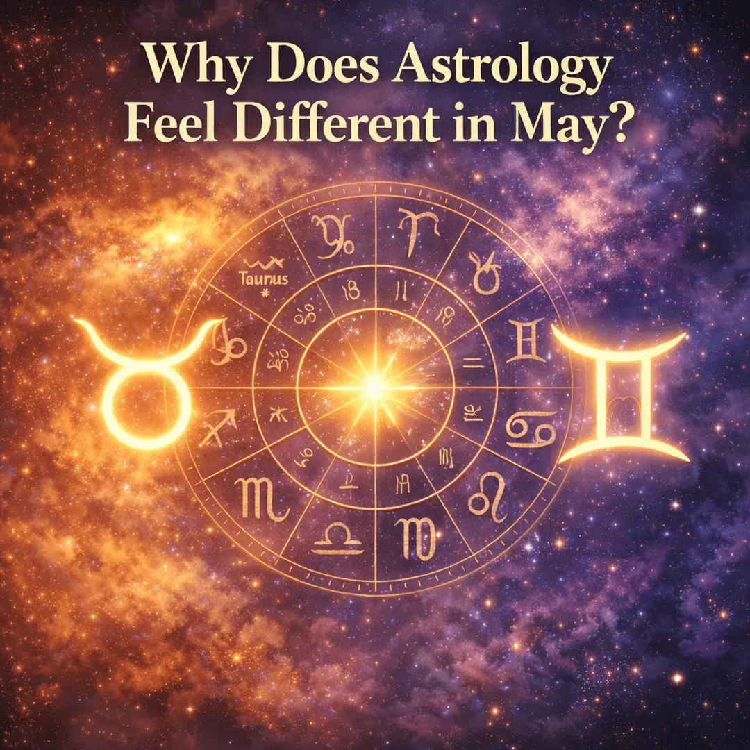 zodiac wheel with Taurus and Gemini symbols glowing in a cosmic sky representing the shift in astrology energy during May