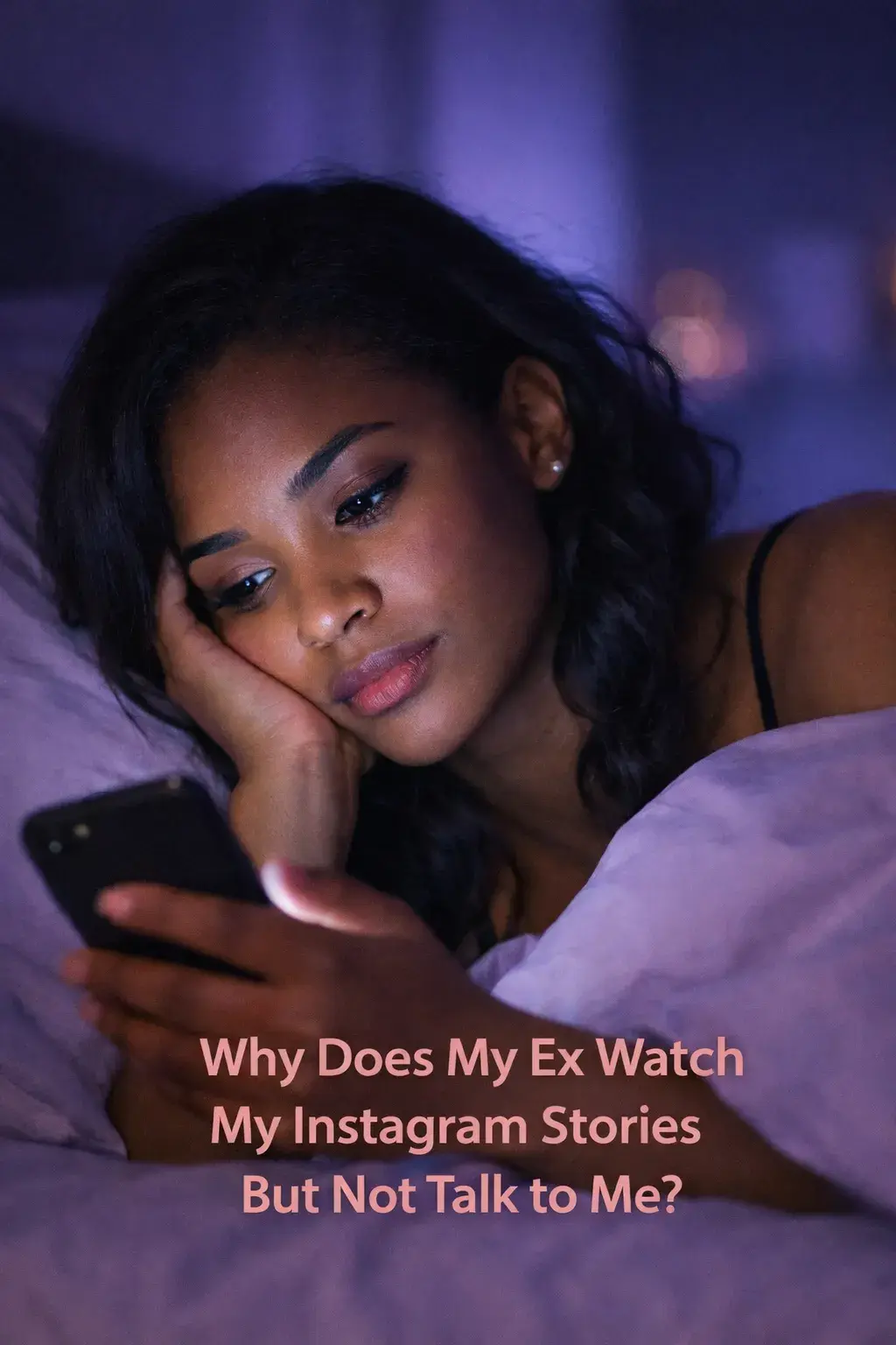 Woman lying in bed at night looking at her phone while wondering why her ex watches her Instagram stories but does not talk to her