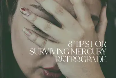 woman with hand over face with text "8 tips for surviving Mercury Retrograde"