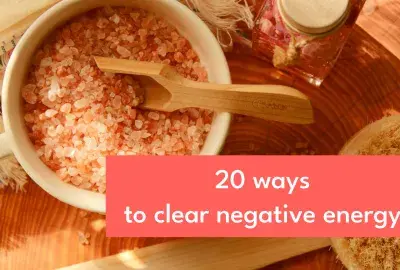 Salt dish with scoop with text box "20 Ways to Clear Negative Energy"