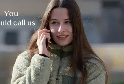 Woman talking on phone with text "You should call us"