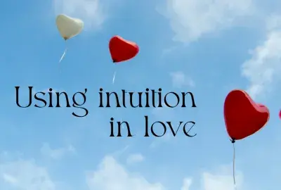 blue sky with heart shaped balloons with text "Using Intuition in love"