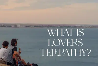 Two people overlooking a bay with text "What is Lovers telepathy?"
