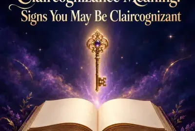 Golden key glowing above an open book
