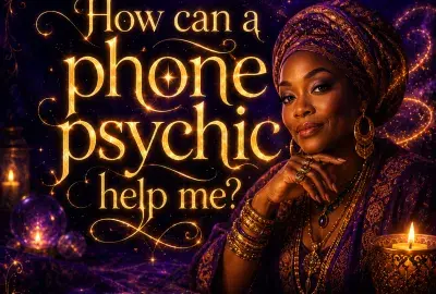 A mystical psychic reader in warm golden light with the words How can a phone psychic help me?
