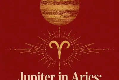 Gold Jupiter and Aries symbol on a deep red background.