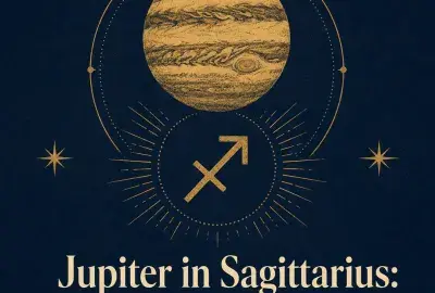 Gold Jupiter and Sagittarius symbol on a deep indigo background.