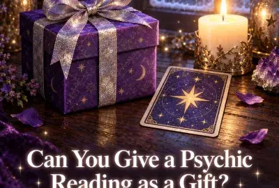 Violet gift box with a candle and tarot card
