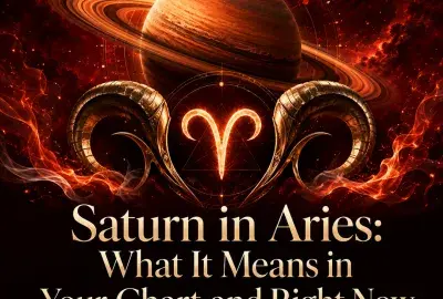 Saturn and the Aries symbol surrounded by metallic ram horns and flames.