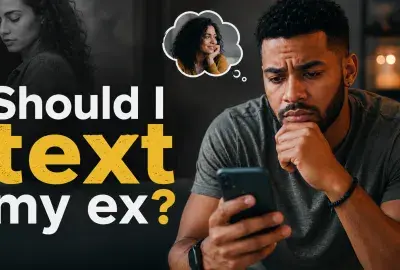Thoughtful man looking at his phone and wondering whether he should text his ex.