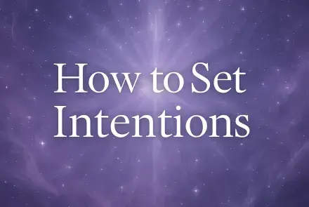 Mystical violet and silver background with glowing aura and celestial light featuring the text “How to Set Intentions” in elegant Playfair Display font