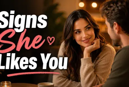 Smiling woman showing romantic interest while talking with a man in a cozy café.